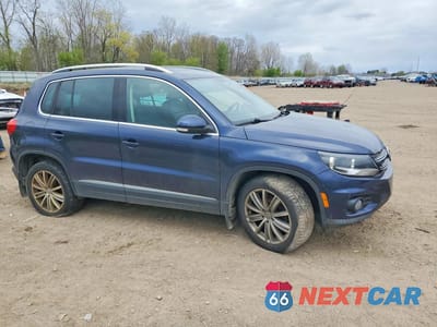 Czwarte zdjęcie samochodu z boku: 2015 VOLKSWAGEN TIGUAN S VIN:WVGBV7AX1FW611316 - miniatura
