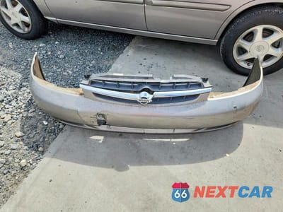 Zdjęcie 12 z 13 samochodu: 1999 NISSAN ALTIMA XE VIN:1N4DL01D6XC260718 - miniatura