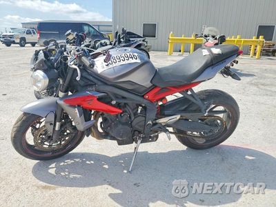 Trzecie zdjęcie samochodu z tyłu: 2014 TRIUMPH MOTORCYCLE STREET TRIPLE R VIN:SMTL03NE6ET656889 - miniatura