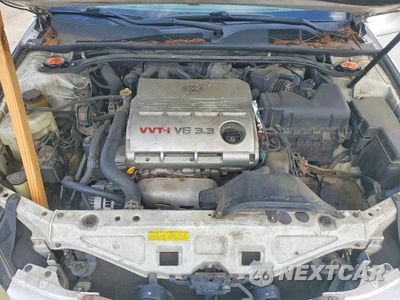 Zdjęcie 11 z 12 samochodu: 2004 TOYOTA CAMRY SOLARA SE V6 VIN:4T1CA38P44U007234 - miniatura