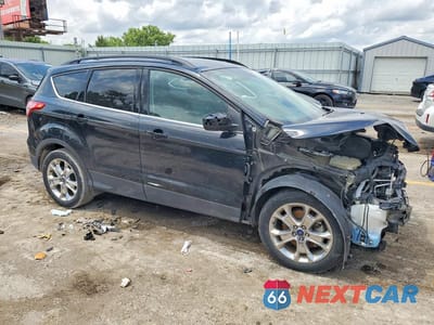 Czwarte zdjęcie samochodu z boku: 2016 FORD ESCAPE SE VIN:1FMCU9G99GUA28985 - miniatura
