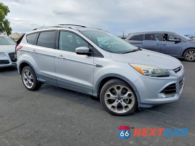 Piąte zdjęcie samochodu w środku: 2014 FORD ESCAPE TITANIUM VIN:1FMCU0J91EUA77938 - miniatura