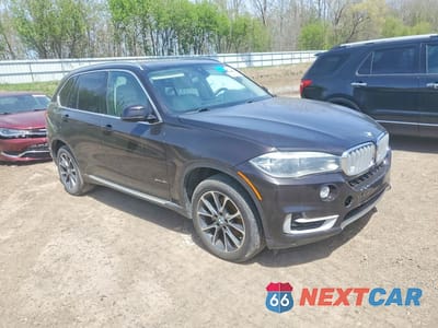 Czwarte zdjęcie samochodu z boku: 2014 BMW X5 SDRIVE35I VIN:5UXKR2C54E0C00177 - miniatura