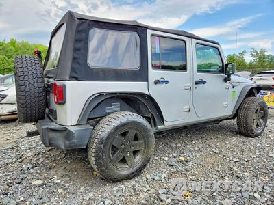 Trzecie zdjęcie samochodu z tyłu: 2010 JEEP WRANGLER UNLIMITED SPORT VIN:1J4BA3H11AL218110 - miniatura