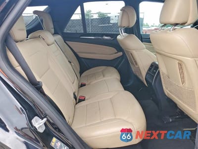 Zdjęcie 11 z 14 samochodu: 2015 MERCEDES-BENZ ML 400 4MATIC VIN:4JGDA5GB1FA482687 - miniatura