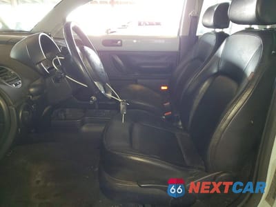 Zdjęcie 7 z 12 samochodu: 2010 VOLKSWAGEN NEW BEETLE VIN:3VWRG3AG3AM036485 - miniatura