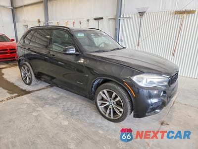 Czwarte zdjęcie samochodu z boku: 2014 BMW X5 XDRIVE50I VIN:5UXKR6C59E0J72333 - miniatura