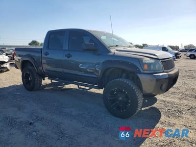 Czwarte zdjęcie samochodu z boku: 2012 NISSAN TITAN S VIN:1N6AA0EK0CN318040 - miniatura