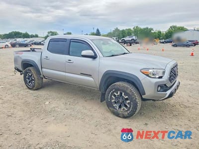Czwarte zdjęcie samochodu z boku: 2023 TOYOTA TACOMA TRD OFF-ROAD VIN:3TMCZ5AN3PM597162 - miniatura
