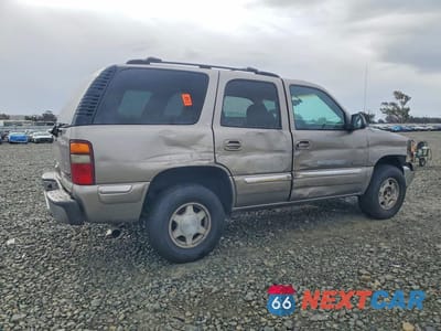 Trzecie zdjęcie samochodu z tyłu: 2002 GMC YUKON VIN:1GKEC13T12R223353 - miniatura