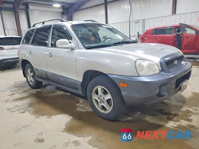 Czwarte zdjęcie samochodu z boku: 2004 HYUNDAI SANTA FE GLS VIN:KM8SC73EX4U595062 - miniatura