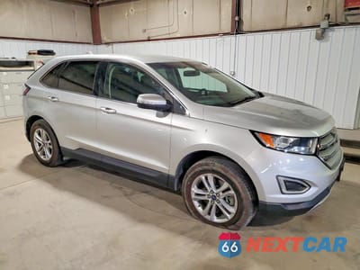 Czwarte zdjęcie samochodu z boku: 2017 FORD EDGE TITANIUM VIN:2FMPK4K98HBC30127 - miniatura