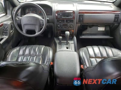 Zdjęcie 8 z 13 samochodu: 2000 JEEP GRAND CHEROKEE LIMITED VIN:1J4GW58N5YC114901 - miniatura