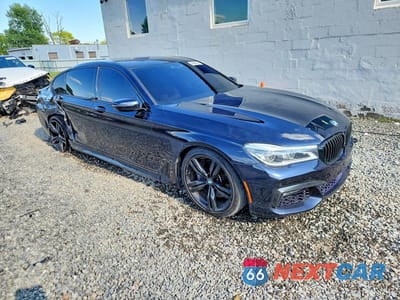 Czwarte zdjęcie samochodu z boku: 2016 BMW 750 XI VIN:WBA7F2C58GG415971 - miniatura