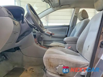 Zdjęcie 7 z 12 samochodu: 2003 TOYOTA COROLLA LE VIN:1NXBR32E13Z131004 - miniatura