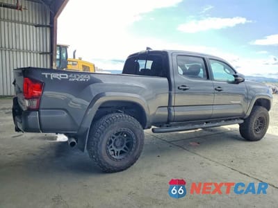 Trzecie zdjęcie samochodu z tyłu: 2016 TOYOTA TACOMA TRD SPORT VIN:3TMDZ5BN0GM001959 - miniatura