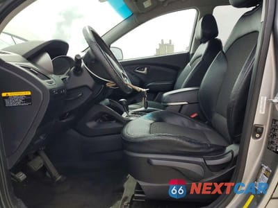 Zdjęcie 7 z 13 samochodu: 2013 HYUNDAI TUCSON GLS VIN:KM8JU3AC2DU556081 - miniatura