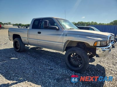 Czwarte zdjęcie samochodu z boku: 1999 DODGE RAM 1500 VIN:3B7HF13Z9XG230403 - miniatura