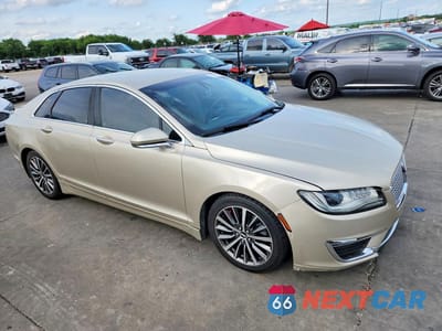 Czwarte zdjęcie samochodu z boku: 2017 LINCOLN MKZ SELECT VIN:3LN6L5C99HR660604 - miniatura