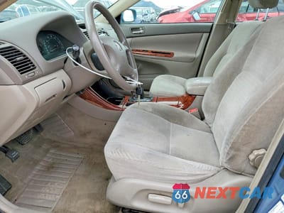 Zdjęcie 7 z 12 samochodu: 2003 TOYOTA CAMRY XLE VIN:JTDBE32KX30170834 - miniatura