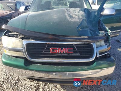 Zdjęcie 11 z 12 samochodu: 1999 GMC NEW SIERRA K1500 VIN:1GTEK14T4XZ517799 - miniatura