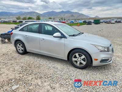 Czwarte zdjęcie samochodu z boku: 2015 CHEVROLET CRUZE LT VIN:1G1PC5SB8F7127296 - miniatura