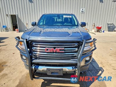Piąte zdjęcie samochodu w środku: 2016 GMC CANYON SLE VIN:1GTG6CE34G1106215 - miniatura