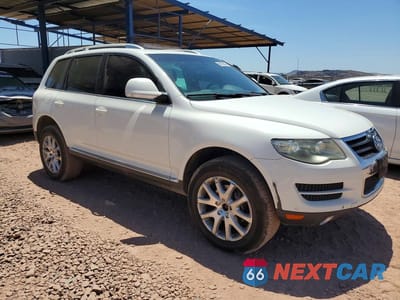 Czwarte zdjęcie samochodu z boku: 2009 VOLKSWAGEN TOUAREG 2 V6 TDI VIN:WVGFM77L39D035902 - miniatura
