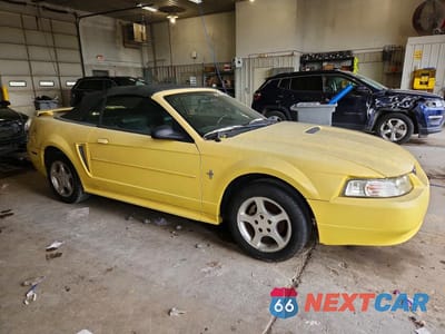 Czwarte zdjęcie samochodu z boku: 2001 FORD MUSTANG VIN:1FAFP44431F142020 - miniatura