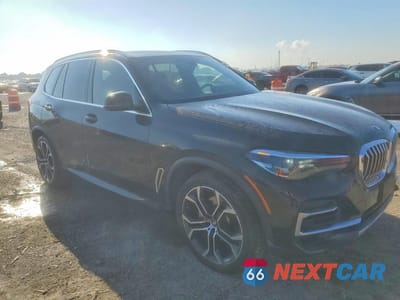 Czwarte zdjęcie samochodu z boku: 2022 BMW X5 XDRIVE40I VIN:5UXCR6C00N9N37423 - miniatura