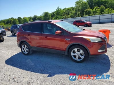 Czwarte zdjęcie samochodu z boku: 2014 FORD ESCAPE SE VIN:1FMCU0GX8EUB12447 - miniatura