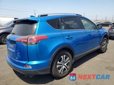 Trzecie zdjęcie samochodu z tyłu: 2018 TOYOTA RAV4 LE VIN:JTMZFREV4JJ753265 - miniatura
