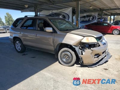 Czwarte zdjęcie samochodu z boku: 2004 ACURA MDX TOURING VIN:2HNYD18624H549233 - miniatura