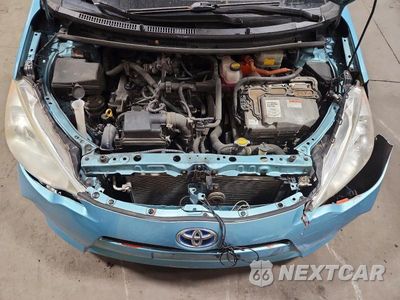 Zdjęcie 11 z 12 samochodu: 2012 TOYOTA PRIUS C THREE VIN:JTDKDTB32C1004605 - miniatura