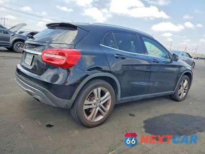Trzecie zdjęcie samochodu z tyłu: 2015 MERCEDES-BENZ GLA 250 4MATIC VIN:WDCTG4GBXFJ086650 - miniatura
