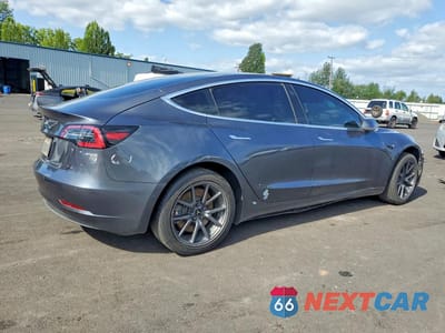Trzecie zdjęcie samochodu z tyłu: 2019 TESLA MODEL 3 VIN:5YJ3E1EA5KF312129 - miniatura