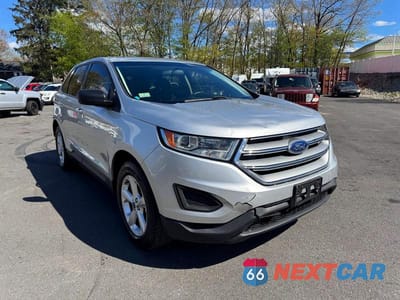 Czwarte zdjęcie samochodu z boku: 2017 FORD EDGE SE VIN:2FMPK4G90HBB08063 - miniatura