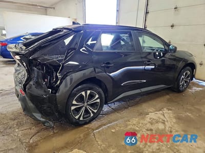 Trzecie zdjęcie samochodu z tyłu: 2024 TOYOTA BZ4X XLE VIN:JTMAAAAA7RA047693 - miniatura