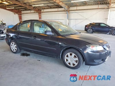 Czwarte zdjęcie samochodu z boku: 2006 MAZDA 3 I VIN:JM1BK12G161448706 - miniatura