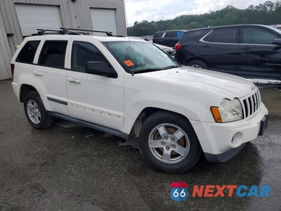 Czwarte zdjęcie samochodu z boku: 2007 JEEP GRAND CHEROKEE LAREDO VIN:1J8GR48K57C532007 - miniatura