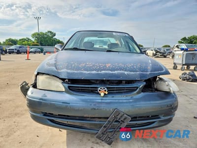 Piąte zdjęcie samochodu w środku: 1999 TOYOTA COROLLA VE VIN:1NXBR12E3XZ268360 - miniatura