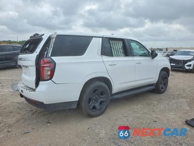 Trzecie zdjęcie samochodu z tyłu: 2022 CHEVROLET TAHOE C1500 VIN:1GNSCLED7NR129327 - miniatura