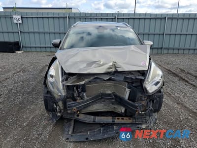 Piąte zdjęcie samochodu w środku: 2014 KIA RONDO VIN:KNAHU8A38E7034942 - miniatura