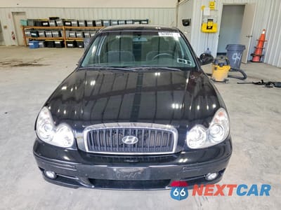 Piąte zdjęcie samochodu w środku: 2003 HYUNDAI SONATA GL VIN:KMHWF25H33A856227 - miniatura