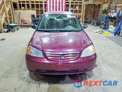 Piąte zdjęcie samochodu w środku: 2002 HONDA CIVIC LX VIN:1HGES16502L074806 - miniatura