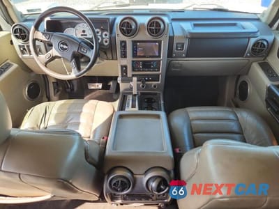 Zdjęcie 8 z 13 samochodu: 2004 HUMMER H2 VIN:5GRGN23U44H122571 - miniatura