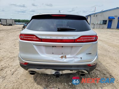 Zdjęcie 6 z 12 samochodu: 2015 LINCOLN MKC VIN:5LMCJ1A90FUJ33638 - miniatura