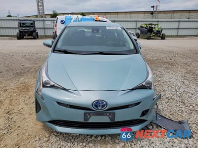 Piąte zdjęcie samochodu w środku: 2017 TOYOTA PRIUS TWO VIN:JTDKBRFU4H3042408 - miniatura