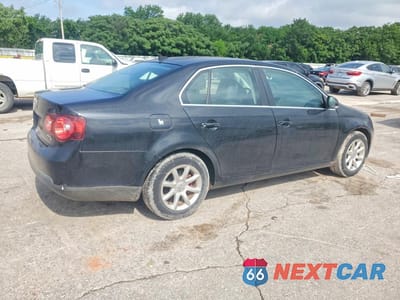 Trzecie zdjęcie samochodu z tyłu: 2009 VOLKSWAGEN JETTA SE VIN:3VWRZ71K69M161126 - miniatura