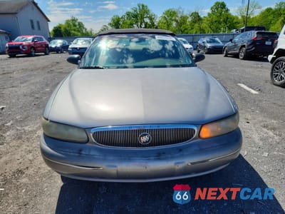Piąte zdjęcie samochodu w środku: 1999 BUICK CENTURY CUSTOM VIN:2G4WS52MXX1414446 - miniatura